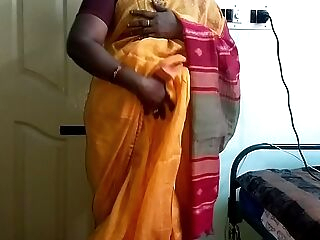 desi  indian nasty tamil telugu kannada malayalam hindi cuckold wife vanitha wearing orange colour saree  showing big boobs and shaved pussy press hard boobs press nip rubbing pussy masturbation